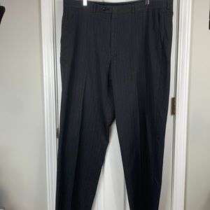 Haggar dark grey dress pants size 42x32. Flat front with side pockets.
